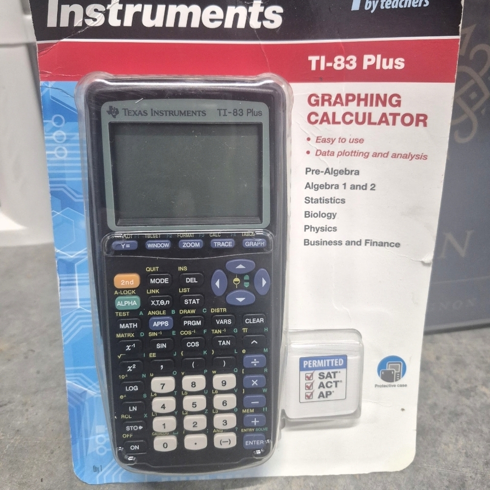Texas Instruments TI-83 Plus Packaging with White and Gray Artwork